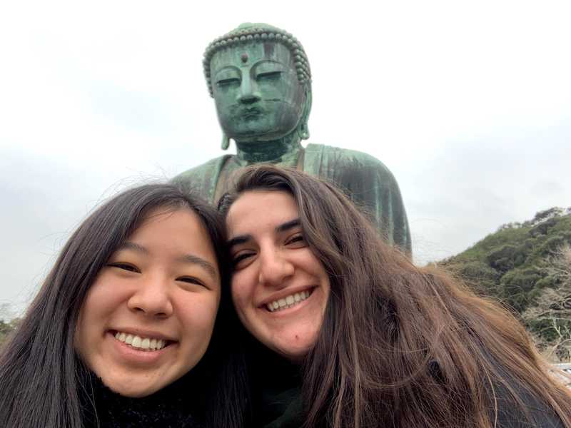 in_front_of_buddha_statue